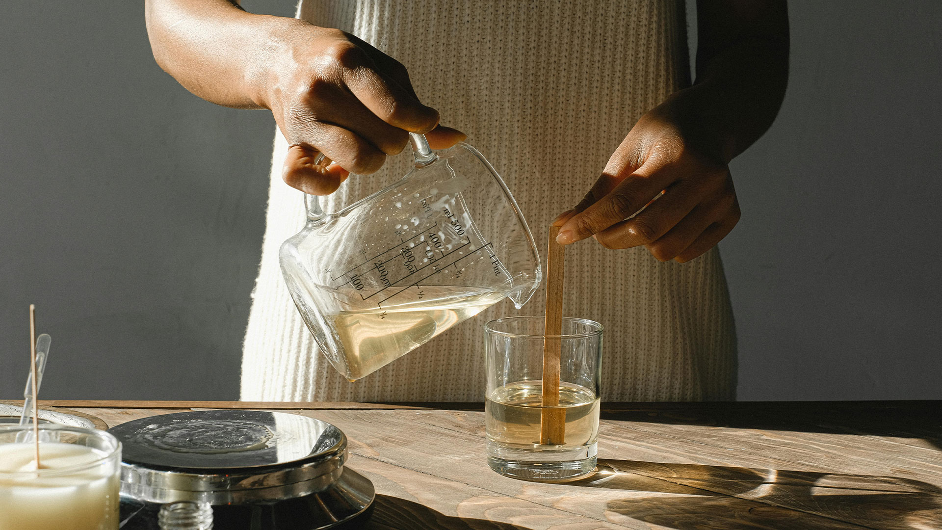  Girl in the process of making candles