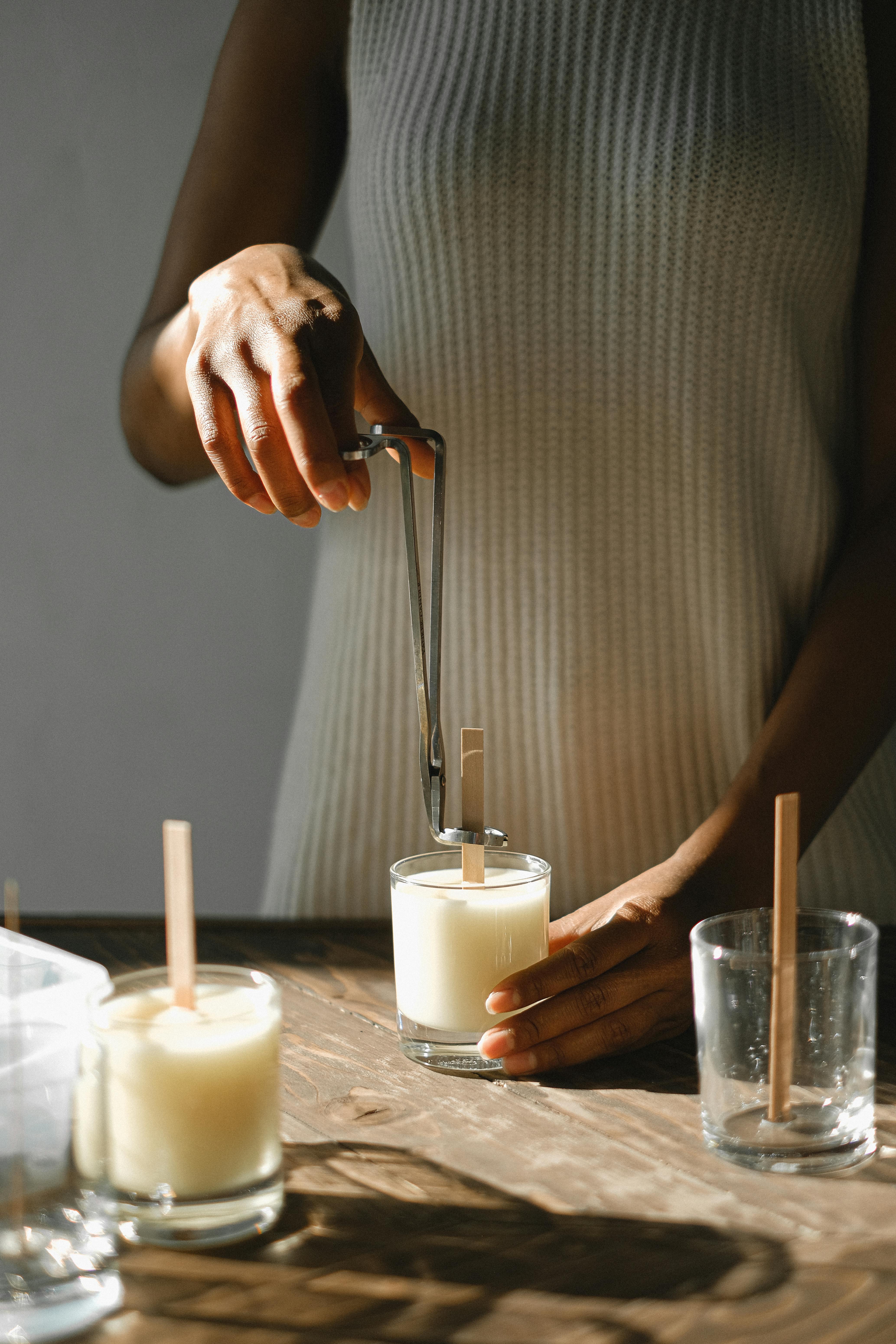  image that shows lighted candles around flowers 